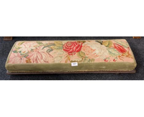 A Victorian tapestry covered footstool, 85 x 12cm.
