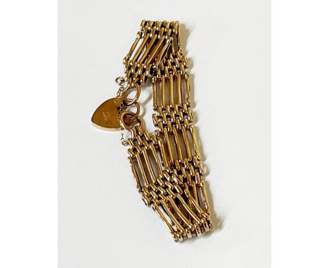 A 9ct rose gold gate bracelet. Weight - 18g.