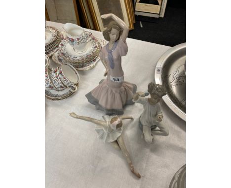 A large Nao figure of a Flamenco dancer, H. 33cm. Together with two Lladro figures (both slightly A/F).