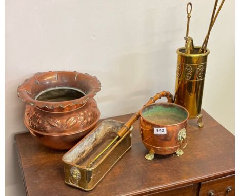 A hammered copper Arts &amp; Crafts spittoon / planter, together with other copper and brass items.