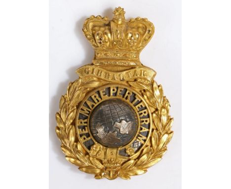 Royal Marines badge, Queen Victoria crown, gilt with silvered globe and blue enamel disc behind the strap bearing the motto '