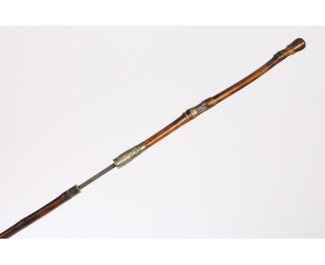 Early 20th Century sword stick to Repton School Combined Cadet Force, in the form of a walking out cane/swagger stick, brass 