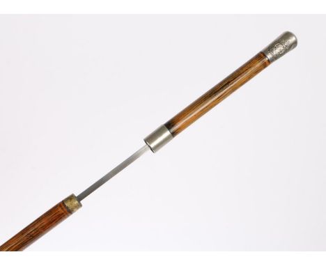 Early 20th century sword stick, white metal top bearing Kings Crown badge to the Royal Engineers with white metal collar and 