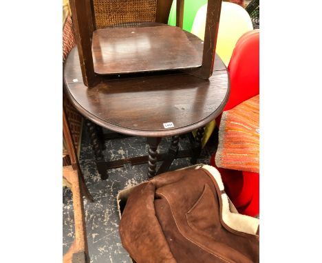 A GATE LEGGED TABLE 