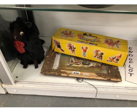 A VINTAGE FUR CAT TOY, A PELHAM PUPPET "GRETAL" AND A SMALL PAINTING GRINDING THE GRAIN.