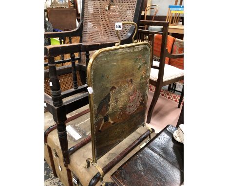 A HAND PAINTED FIRE SCREEN