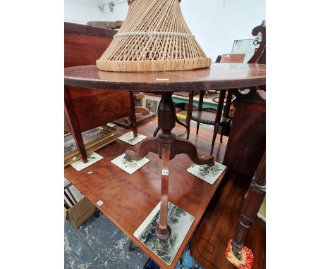 A 19th C. OAK TRIPOD TABLE.