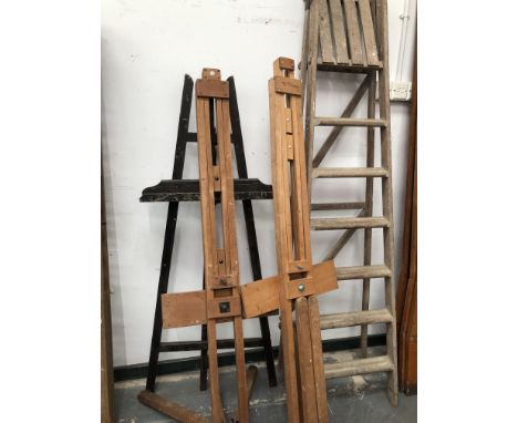 THREE ARTISTS EASELS AND A WOODEN STEP LADDER.&nbsp;&nbsp;