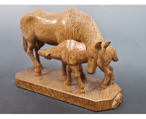 ROBERT THOMPSON WORKSHOPS, A MOUSEMAN CARVED OAK MARE AND FOAL FIGURE WITH MOUSE SIGNATURE TO PLINTH BASE.