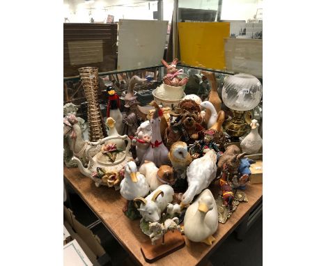A COLLECTION OF DUCK, DOG AND OTHER FIGURES TOGETHER WITH AN OIL LAMP AND A FLORAL APPLIED TEA POT
