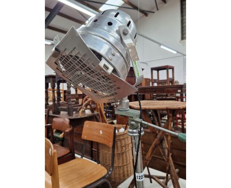 A TRIPOD SUPPORTED LAMP 