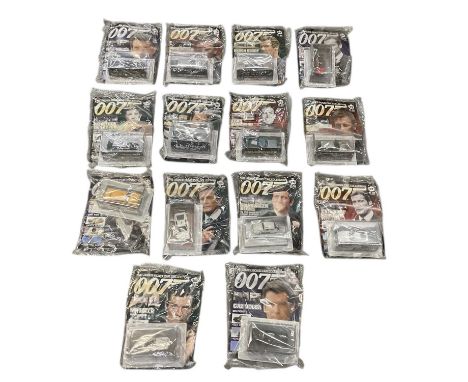 A collection of fourteen James Bond 007 models, including Acrostar, Beach Buggy, Gaz Volga, Range Rover Sport, Mercedes Benz 