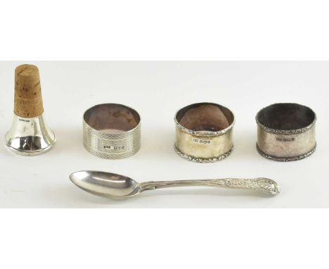 LEE &amp; WIGFULL; a pair of Edward VII hallmarked silver napkin rings, both Sheffield 1909, a George V hallmarked silver nap