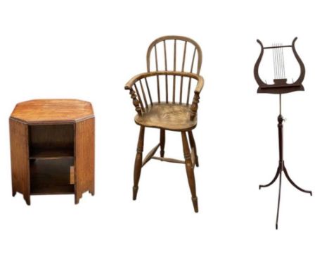 An oak and elm spindle back Windsor type child's highchair, height 89cm, an Edwardian mahogany music stand, with lyre shaped 