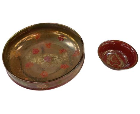 ROYAL LANCASTRIAN; an early 20th century red lustre glazed gilt decorated bowl, diameter 32cm, and a Christmas 1928 red lustr