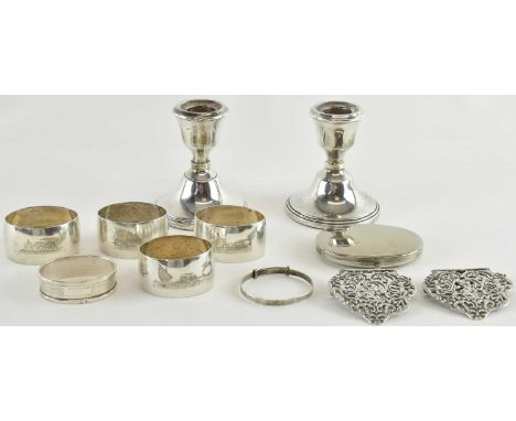 A pair of Elizabeth II hallmarked silver filled squat candlesticks, Birmingham 1974, height 9cm, a set of four Egyptian oval 
