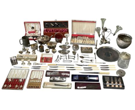 A large quantity of assorted silver plated items, including a four branch epergne with green glass inserts (lacking one), sil