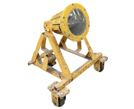 A WWII period yellow painted military army floodlight/hazard light, height 75cm.