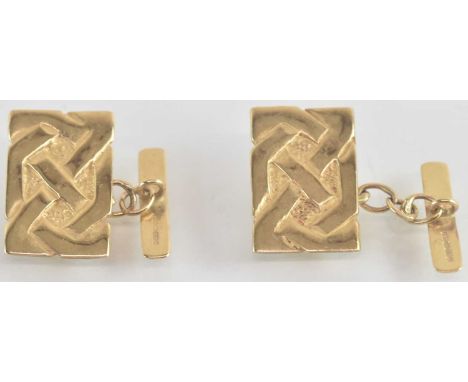 A pair of 9ct gold cufflinks with Celtic design, united by short chain, combined approx 3.8g.