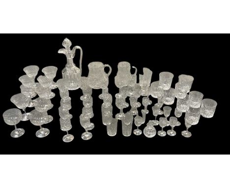 A quantity of assorted early 20th century and later cut and crystal glassware, including a decanter, two jugs, six champagne 