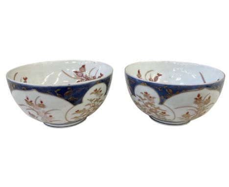 A pair of late 18th/early 19th century Japanese Imari decorated porcelain bowls, both diameter 15.5cm, both height 8cm (2).