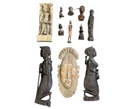 A modern relief carved wooden wall hanging panel depicting Apsara, 50 x 17cm, and a collection of African tribal wooden carvi