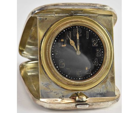 E J CLEWLEY &amp; CO; a George V hallmarked silver travelling alarm clock, the black painted dial set with Arabic numerals an