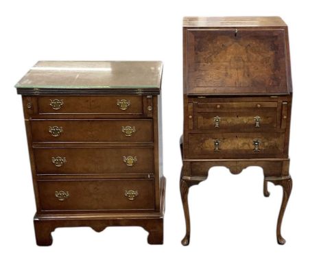 A 1930s burr walnut veneered bureau of small proportions, with pair of pull-out slides above fall front enclosing fitted inte