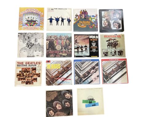 THE BEATLES; a collection of fourteen Beatles albums including the red and blue albums, first pressing 'Revolver', 'Help!', '