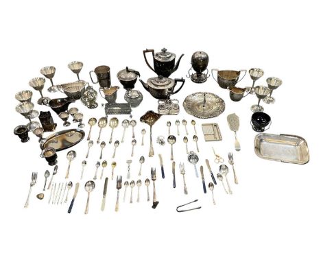 A large collection of assorted silver plated items, including a silver plated four piece tea service, flatware, sauceboat, a 