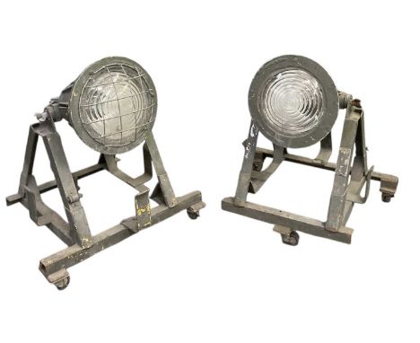 A pair of WWII period military army floodlights/hazard lights, both height approx 65cm.Condition Report: There is no PAT test