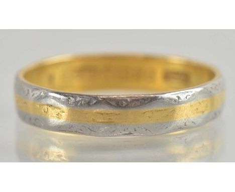 A 22ct gold and platinum band ring, the central band of yellow gold, with outer rim of platinum, size P, approx 3.7g.