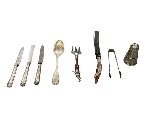 A novelty silver plated Australian fish serving fork, with turned wooden handle surmounted decoration of a kangaroo, length 2