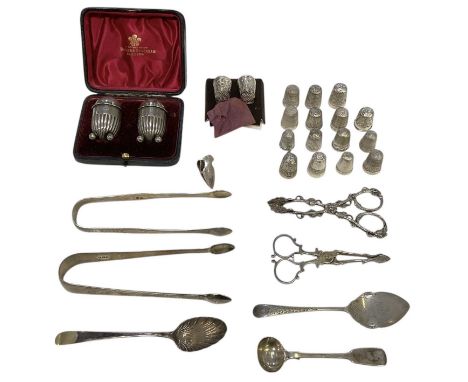 HORACE WOODWARD &amp; CO LTD; a cased pair of late Victorian hallmarked silver pepperettes, in original fitted case from Brac