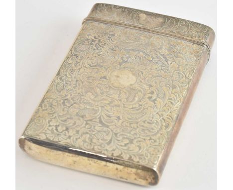 TAYLOR &amp; PERRY; a large Victorian hallmarked silver cigarette case, decorated with a building surrounded by foliate desig