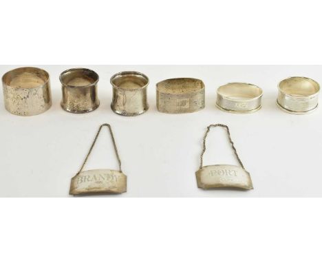 ATKIN BROTHERS; a George V hallmarked silver napkin ring, Sheffield 1919, five further napkin rings and a cased pair of Briti