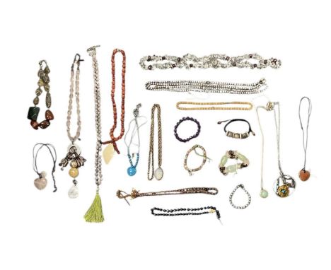 A quantity of semi-precious stone set costume jewellery including jade, amethyst, rock crystal, rose quartz, coral, etc.