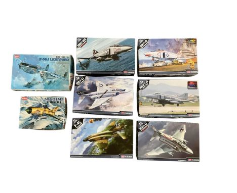 ACADEMY; eight 1:48 scale model fighter jet kits, including 'USN F-4B, VF-111 Sundowners', 'F-4C, Vietnam War', 'USN F-4J, VF