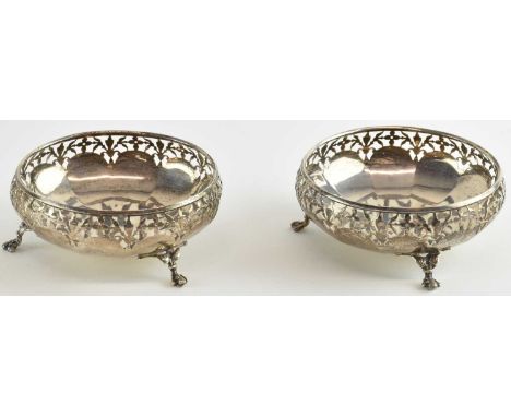 ADIE BROTHERS LTD; a pair of George V circular hallmarked silver dishes, both with pierced rims, both diameter 10cm, combined