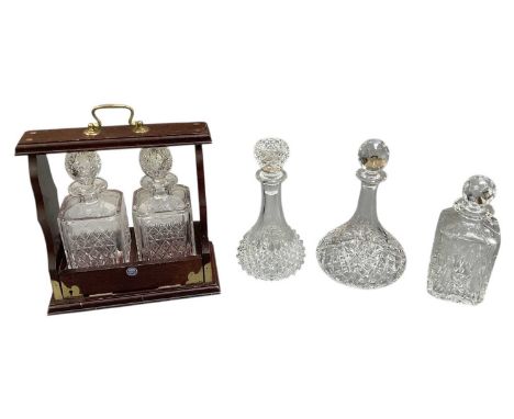THOMAS WEBB; a modern oak framed tantalus enclosing two Thomas Webb crystal glass decanters, height 31cm, width 30cm, also a 