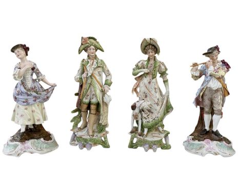 A large pair of early 20th century Continental porcelain figures of musician and dancer, both height approx 36cm, and a furth