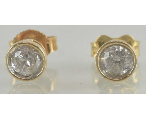 A pair of 14ct yellow gold diamond stud earrings, each approx 0.3ct, total diamond weight approx 0.6ct, combined approx 1.1g.