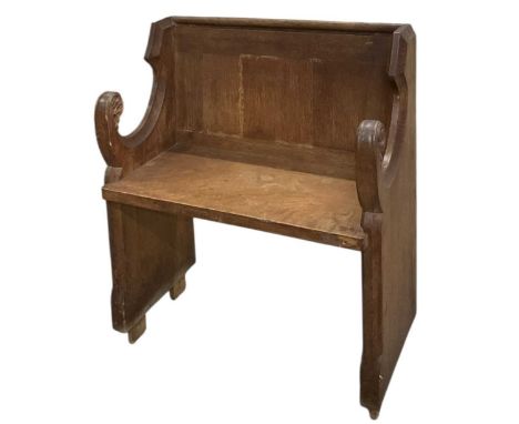 A late 19th century oak Gothic Revival pew of small proportions, width 75cm.