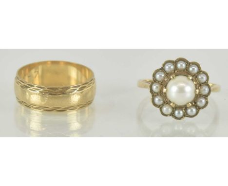 A 9ct yellow gold wedding band, size O, and a 9ct yellow gold seed pearl set flower head dress ring, size P, combined approx 