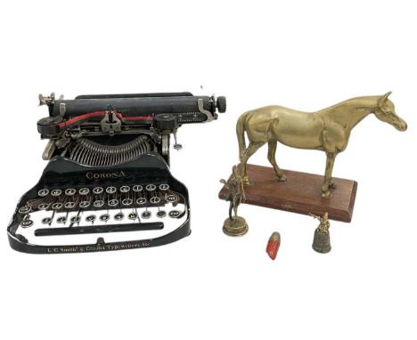 L C SMITH &amp; CORONA TYPEWRITERS INC; an early to mid 20th century typewriter, 24 x 30cm, a brass figure of a standing hors
