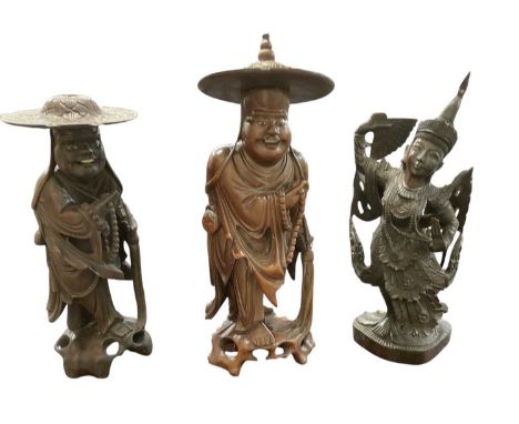 Three Chinese carved rootwood figures, including two figures of Shou Lao, height of tallest 41cm, and a carved hardwood figur