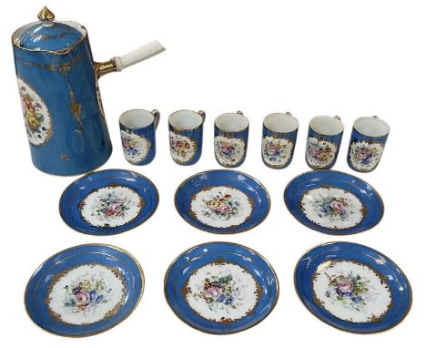 An early 20th century blue ground six setting coffee service in the style of Sèvres, comprising six coffee cans, six saucers 