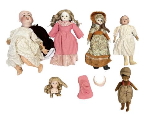 A collection of five early 20th century and later dolls, comprising a porcelain headed German doll, (af), Alberon porcelain d