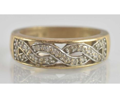 A 9ct gold white stone Celtic pattern ring, size M, approx 3.9g.