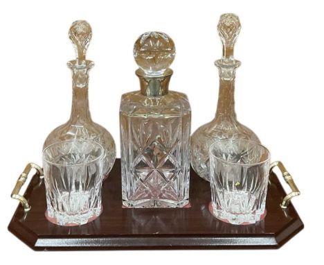 A drinks tray with a harlequin set, comprising a pair of matched globe decanters, with cut fence pattern and diamond facet ne